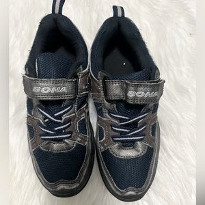 Beat up gray and blue Bona little kid’s sneakers